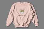 Dusty pink sweatshirt with floral graphic and "FLORAL" and "& FABULOUS" text