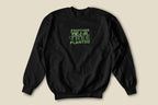 Black crewneck sweatshirt with small green “Another Year, Tree Planted” chest graphic.