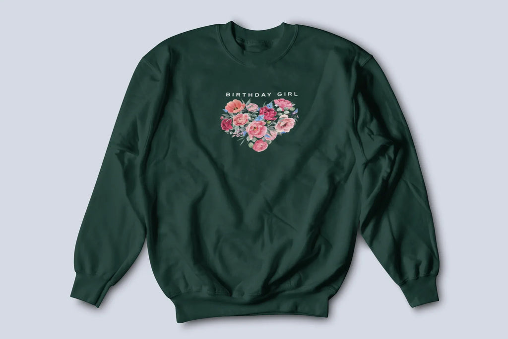Forest green sweatshirt with “BIRTHDAY GIRL” text and floral heart graphic