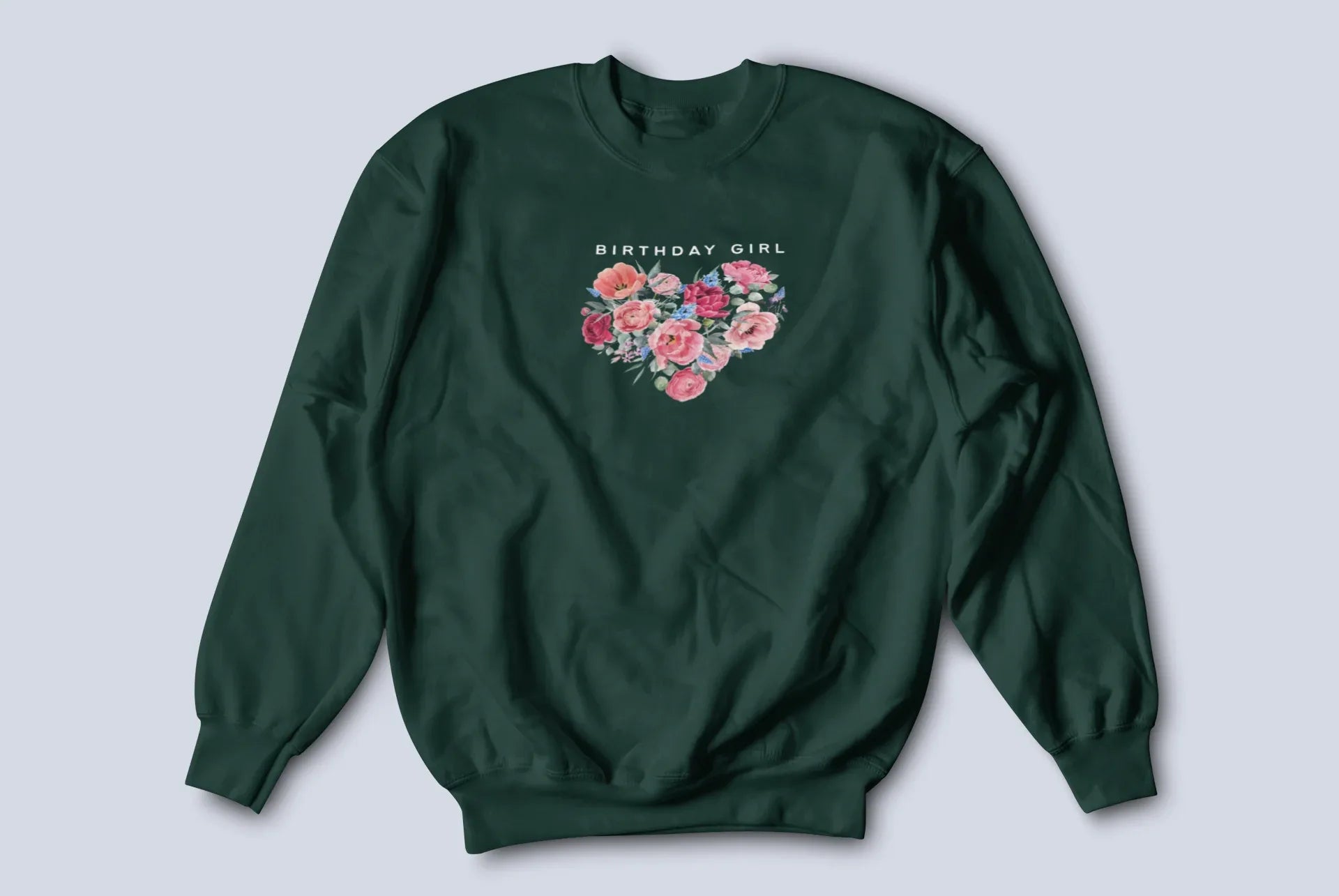 Forest green sweatshirt with “BIRTHDAY GIRL” text and floral heart graphic