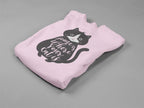 Pink sweatshirt folded, featuring a black cat graphic with “home where your cat is” text.