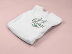 White crewneck sweatshirt with floral “Just Bloom” graphic