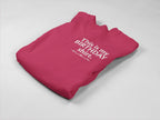 Pink crewneck birthday sweatshirt with printed “This is my BIRTHDAY shirt”