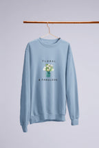 Light blue sweatshirt with small floral bouquet in vase graphic and 'Floral & Fabulous' text
