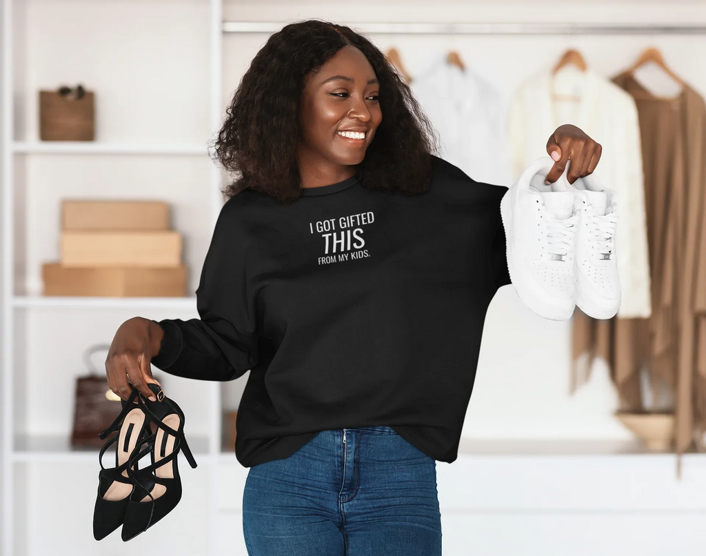 Women's black crewneck sweatshirt with 'I got gifted this from my kids' chest text print