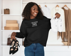 Women's black crewneck sweatshirt with 'I got gifted this from my kids' chest text print