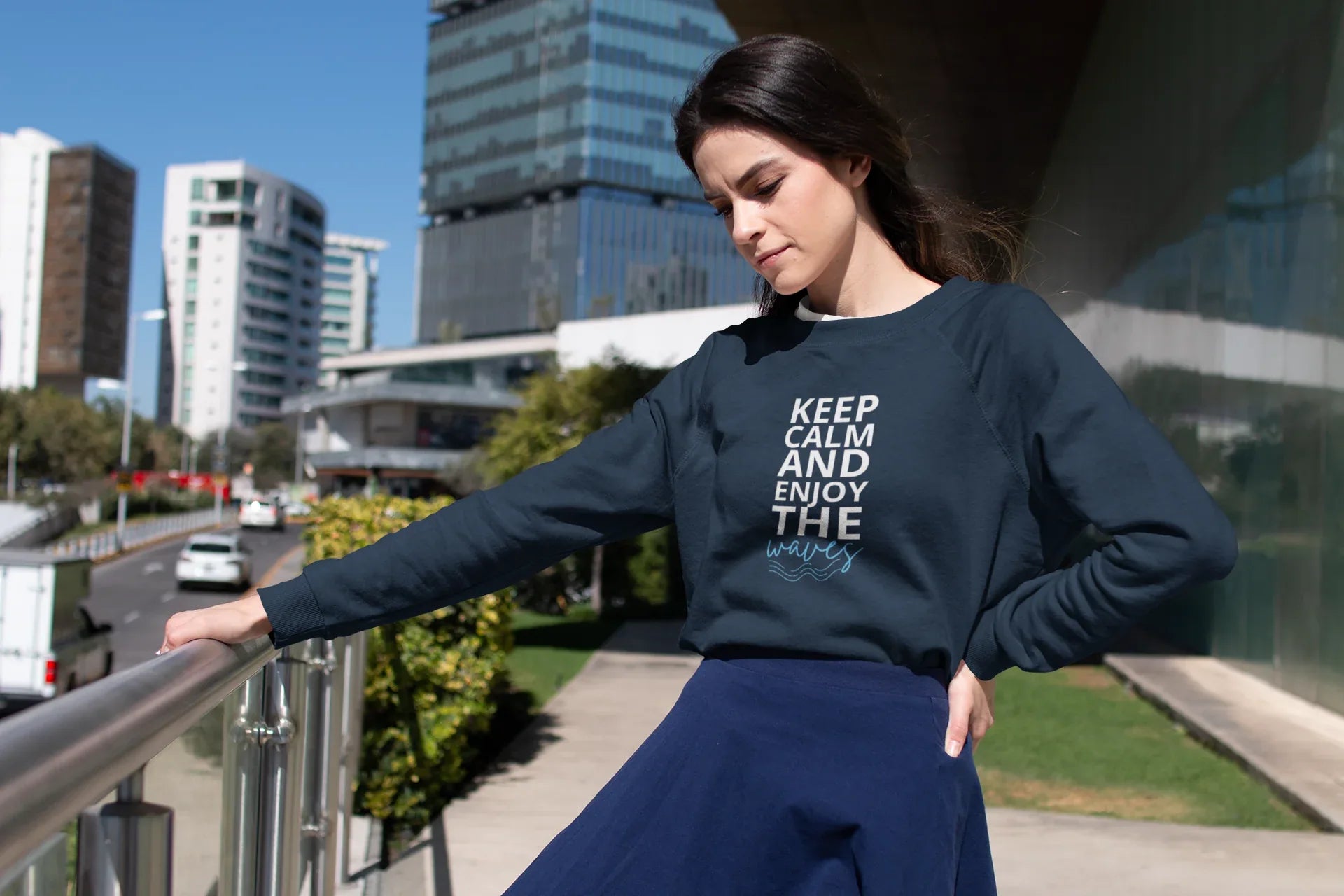 Navy sweatshirt on model, Keep Calm and Enjoy the waves front print