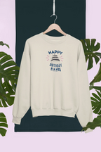 Cream birthday sweatshirt with “Happy Birthday” cake graphic and small burst accents