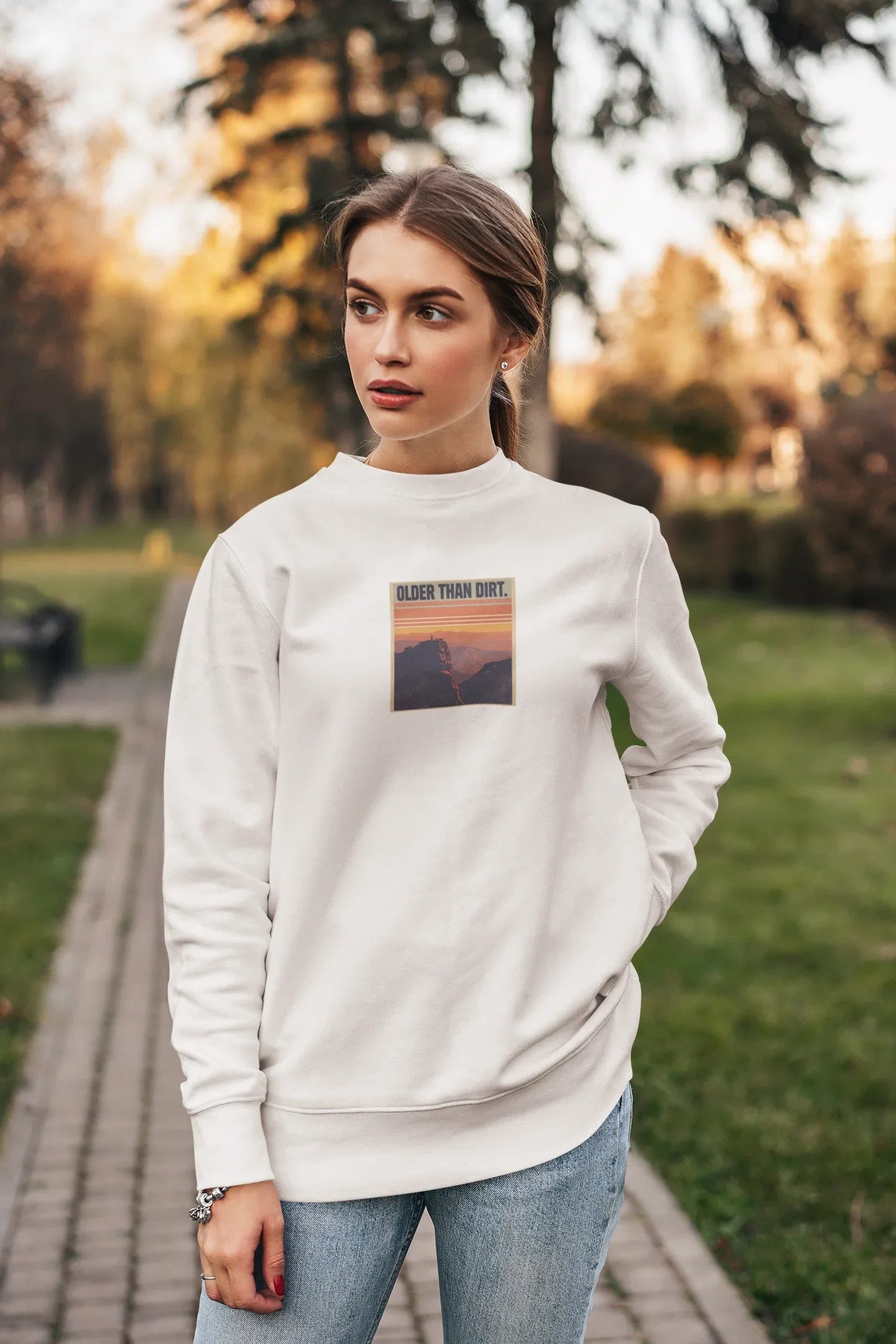 White crewneck sweatshirt with front graphic print