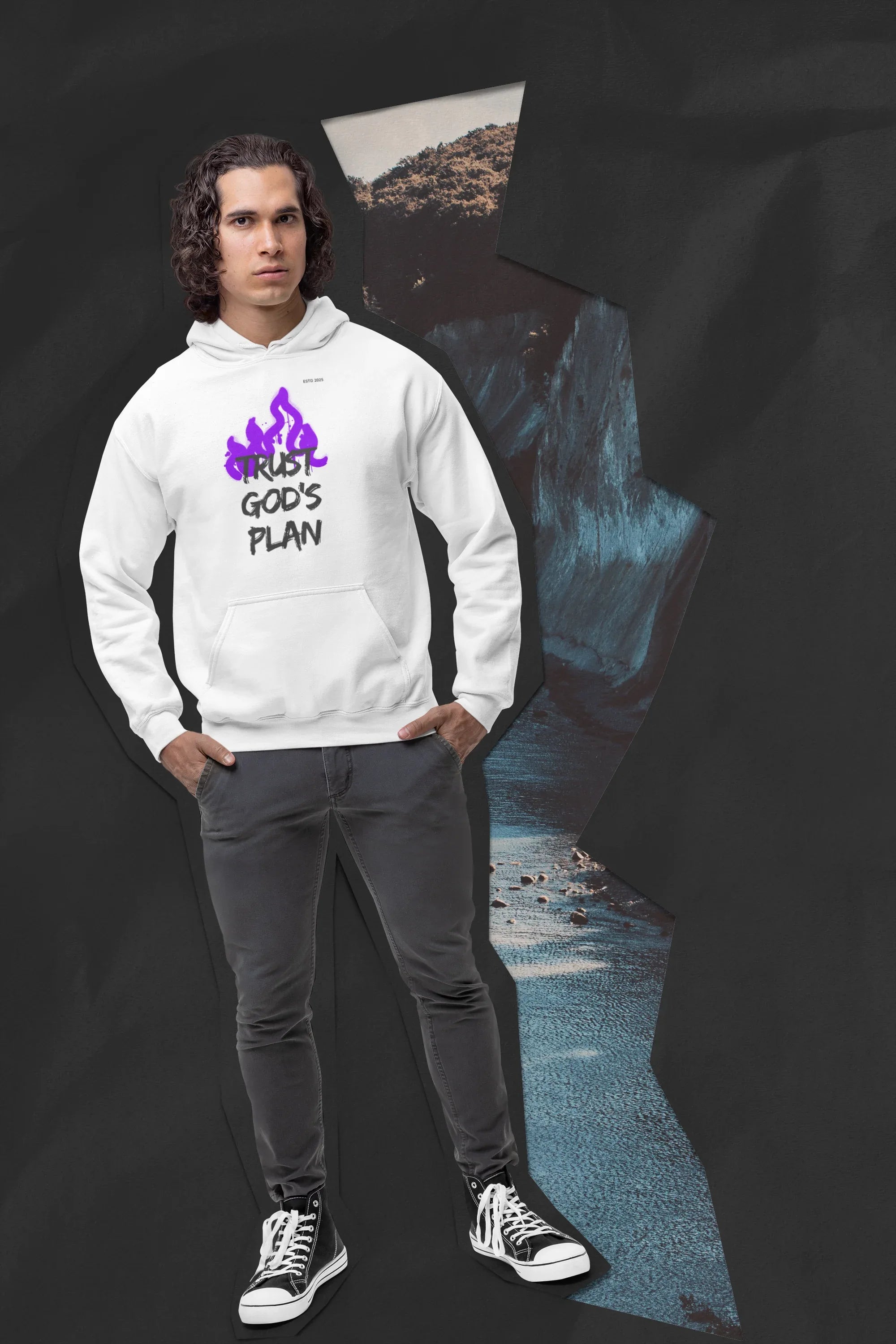 White hoodie with kangaroo pocket and purple flame-style text graphic.