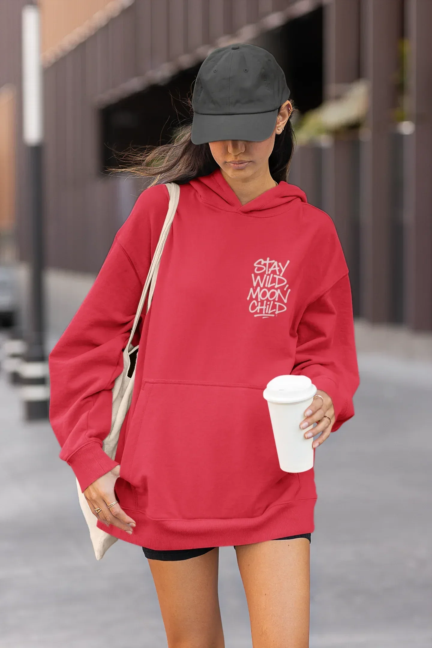 Red minimal graphic hoodie with hood and front pocket, “Stay Wild Moon Child” chest print