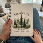 Dad notebook personalised with Freddie, Daisy and Ruby held on a lap