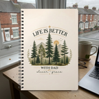 Dad notebook personalised with Oliver and Grace on a desk