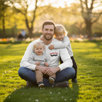 Dad sitting kids white