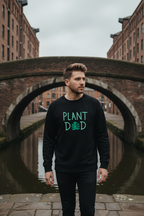 Black crewneck sweatshirt with 'PLANT' text and plant icon front graphic