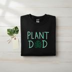 Black crewneck sweatshirt with “PLANT DED” plant graphic and hanging tag