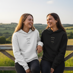White hoodie with drawstring hood and small chest slogan graphic in dark print