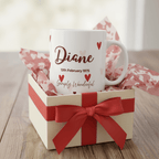 White ceramic heart mug with “Diane” and small red heart details, date text