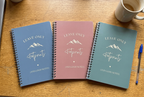 Set of A5 hiking notebooks with blue and pink covers, spiral binding, lined pages