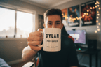 Personalised gamer mug held up with DYLAN, PRO GAMER, EST 03.09.1997