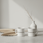 White ceramic mug with handle, printed text “Discombobulated.”
