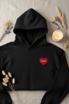 Black embroidered hoodie with heart name patch 'EMMA' on the chest