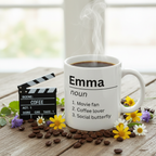 White mug with Emma noun definition text and list; coffee inside, rising steam