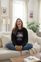 Black crewneck sweatshirt with floral graphic and 'EMMA'S GARDEN' print