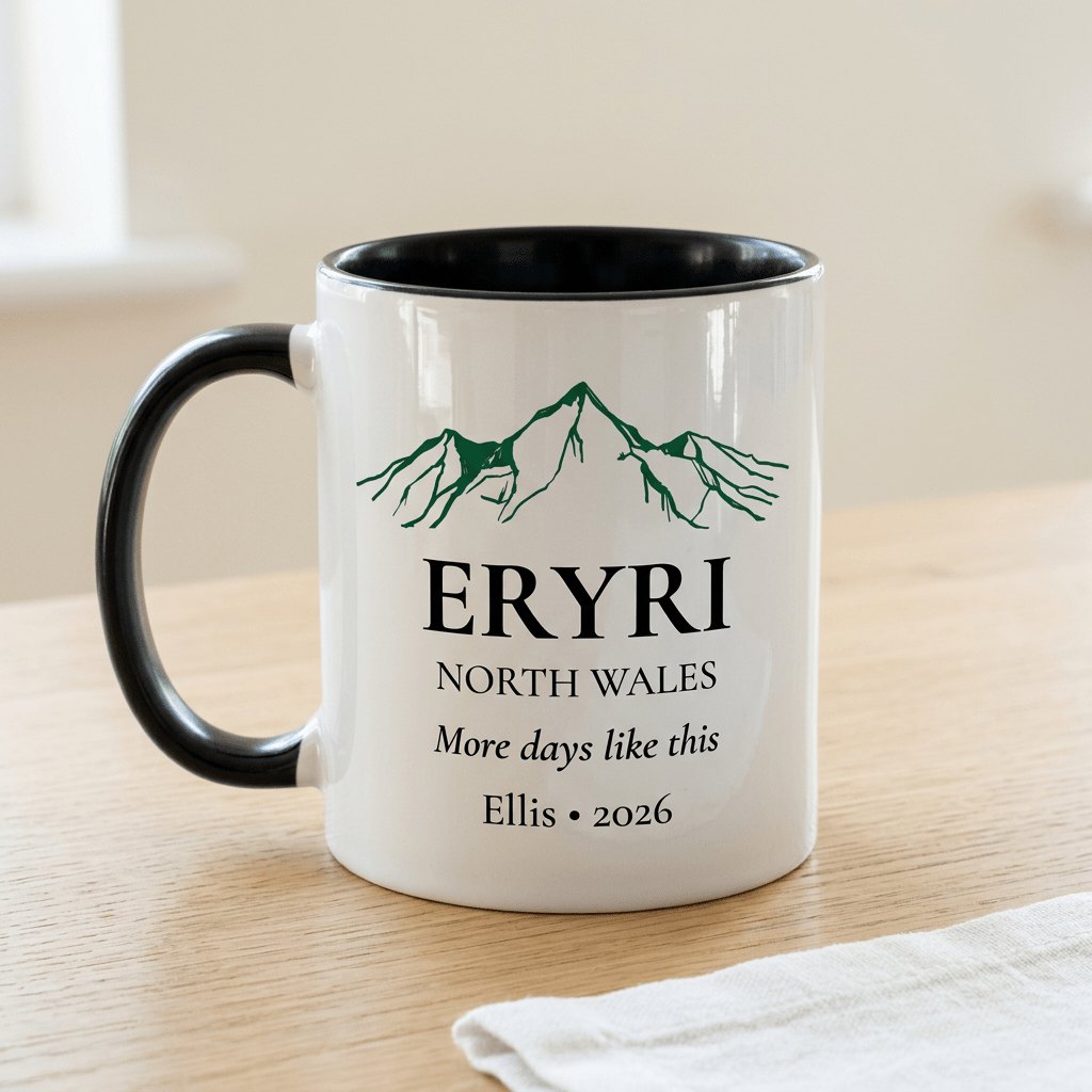 Eryri mug with More days like this and Ellis 2026 on a pale oak table