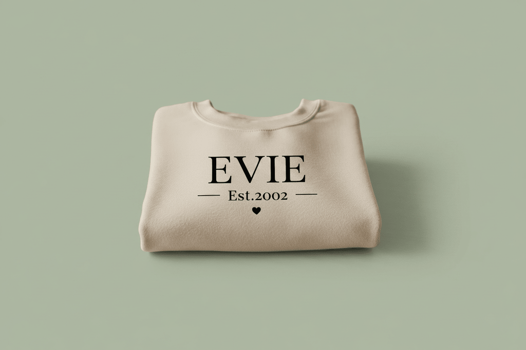 Cream crewneck sweatshirt with EVIE and Est.2002 print
