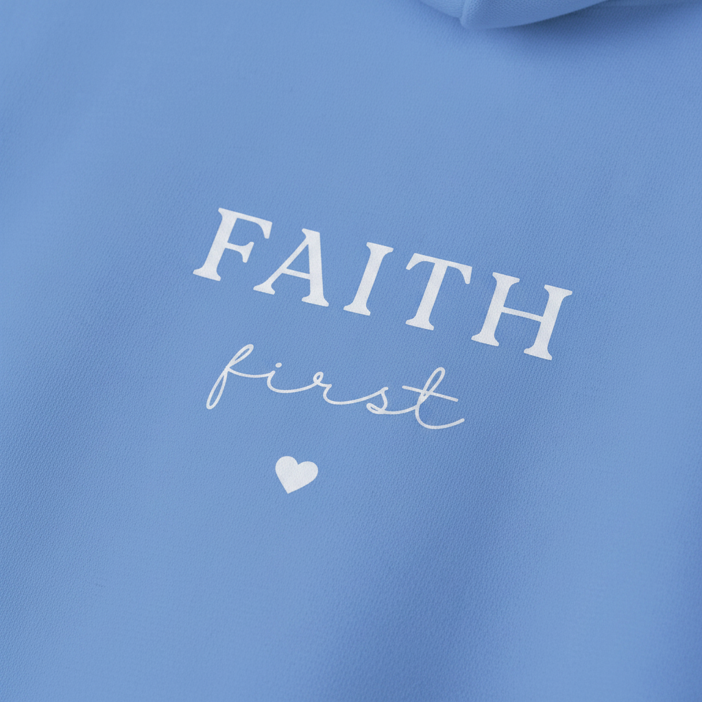 Light blue hoodie front design with large 'FAITH' text and small heart