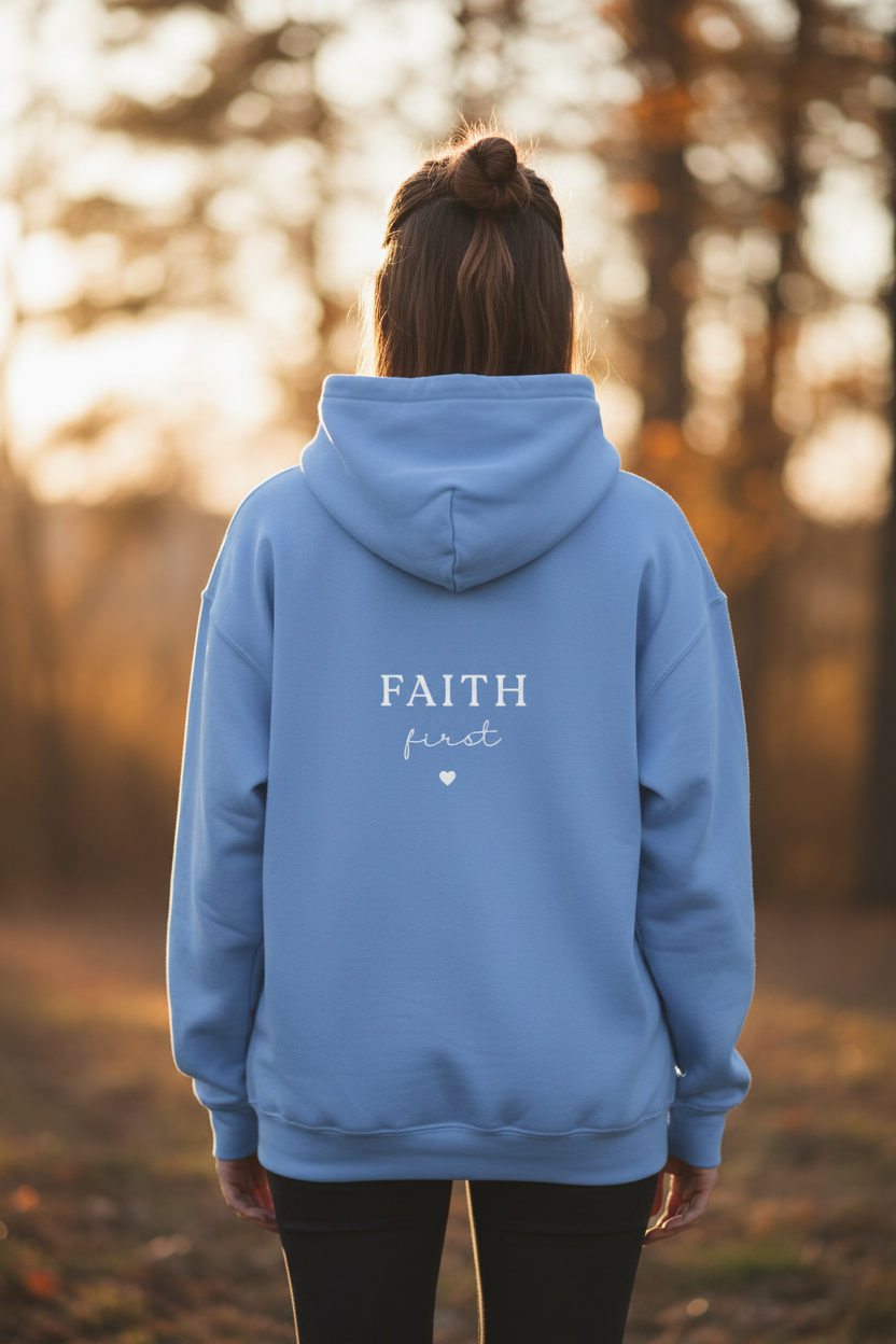 Light blue unisex hoodie sweatshirt with back hood and “FAITH first” graphic