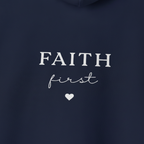 Navy hoodie fabric close-up with “FAITH first” text and heart graphic