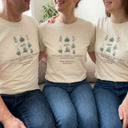 Natural botanical t-shirt with potted plant graphic and “Our little corner of the world” text
