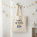 Off-white cotton tote bag with 'Farah's eid treats' print and gift icon
