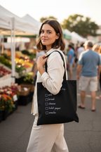 Black tote bag with 'to buy' checklist and empty checkboxes.