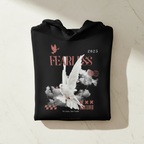 Black unisex hoodie front view with bird/feather graphic, clouds, and 2025