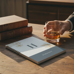 Personalised A5 notebook with initial H and name HARRISON on light cover on table
