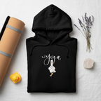 Black yoga duck pose hoodie with front duck graphic and drawstring hood