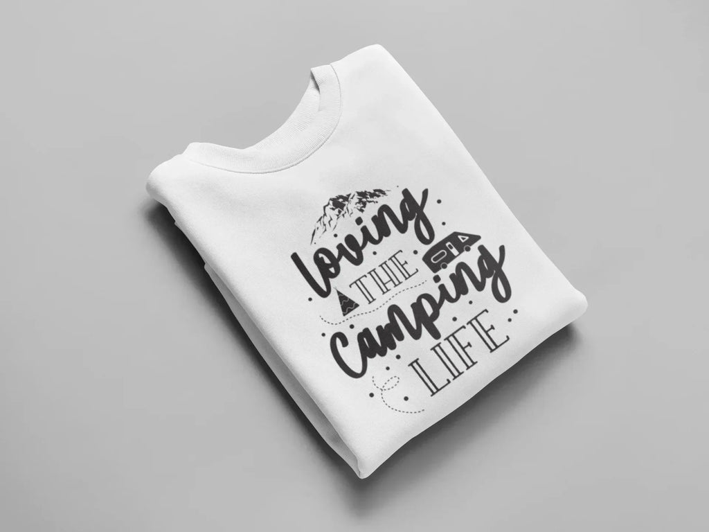 White crewneck sweatshirt folded with black "Loving the Camping Life" graphic