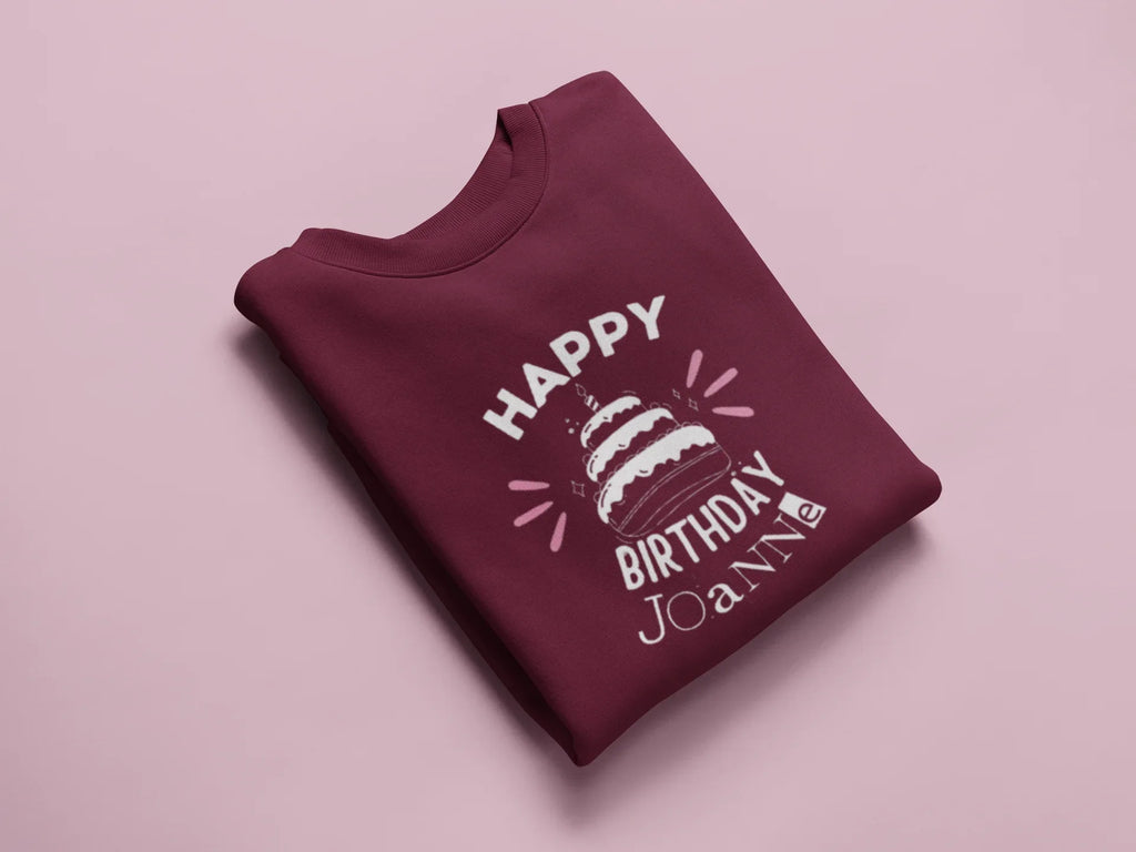 Maroon sweatshirt with 'Happy Birthday' cake graphic and custom name text