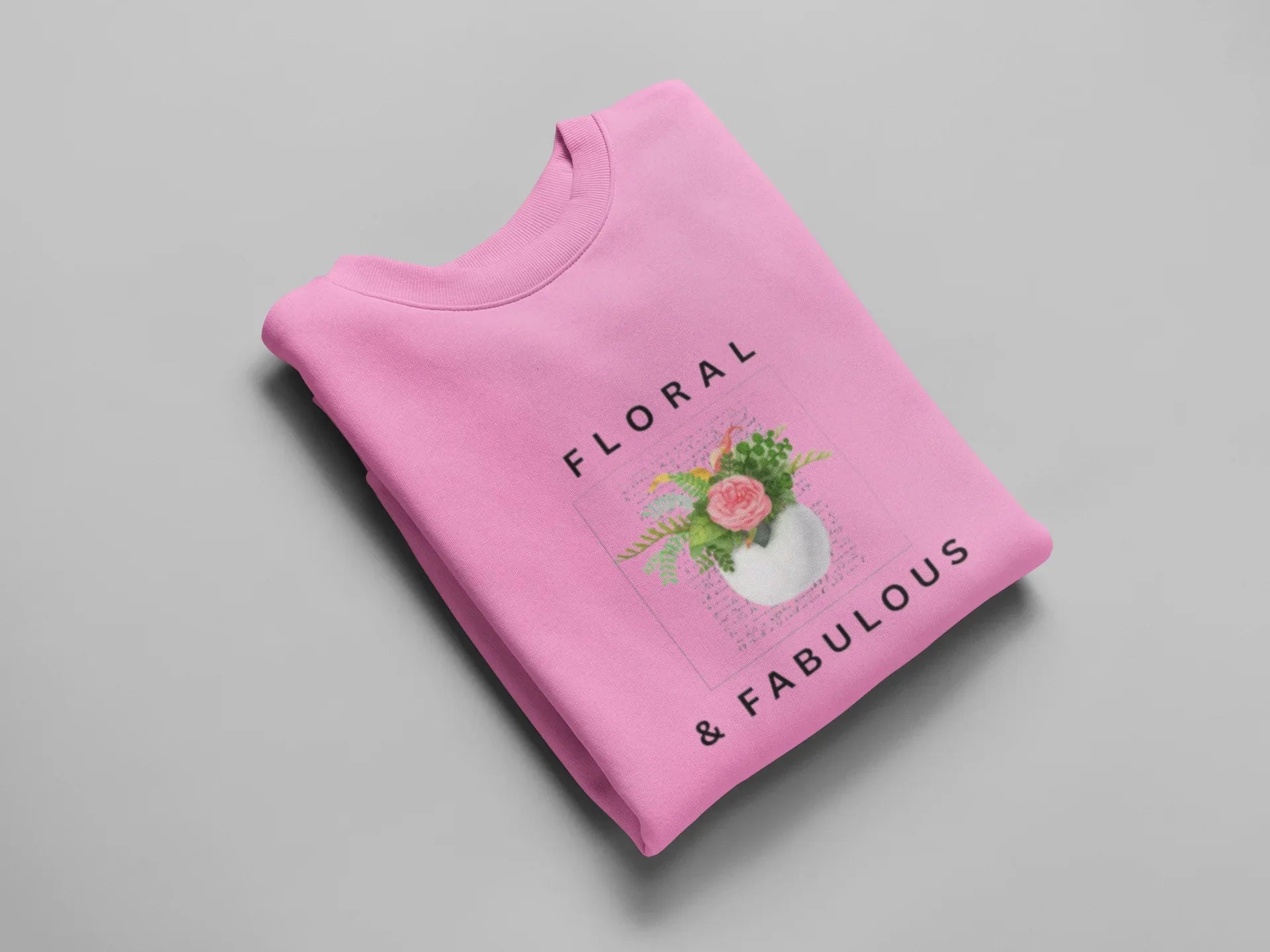 Candyfloss pink crewneck sweatshirt with Floral & Fabulous floral graphic.