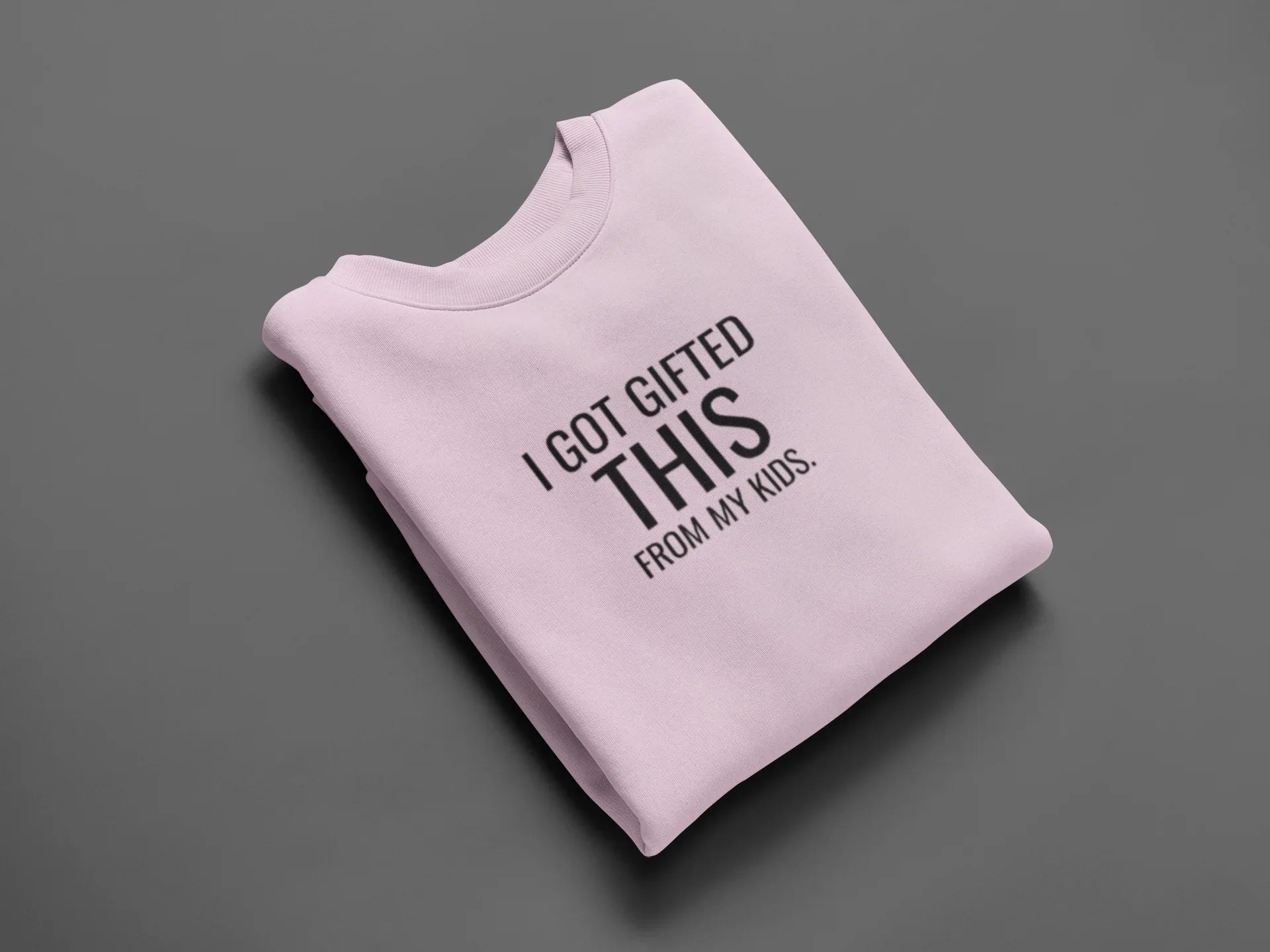 Light pink sweatshirt with front graphic text: "I GOT GIFTED THIS" from "MY KIDS".