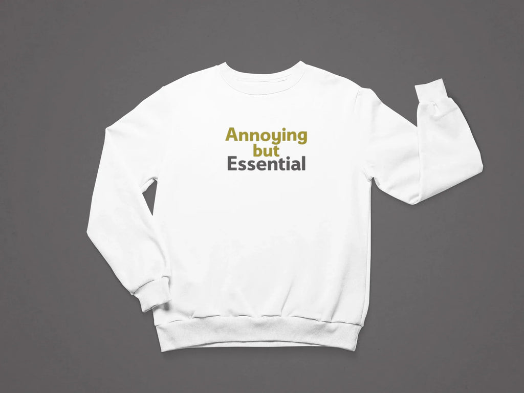 White unisex crewneck sweatshirt with 'Annoying but Essential' slogan text, front view.