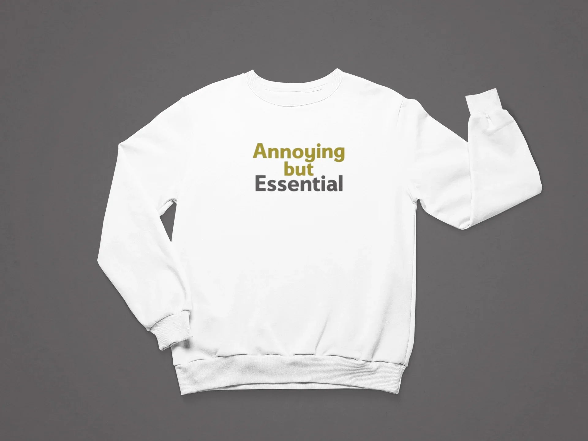 White unisex crewneck sweatshirt with 'Annoying but Essential' slogan text, front view.