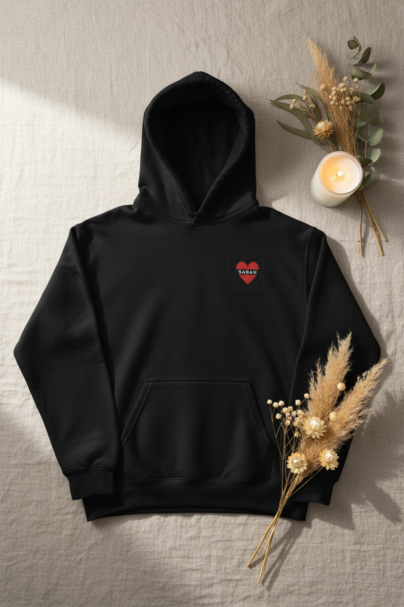Black personalised embroidered hoodie with heart patch on chest