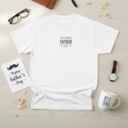 White T-shirt with centered "I'm a proud Father" minimalist text and small dot accents