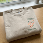 Sand sweatshirt with floral heart graphic and YORKSHIRE family text on chest