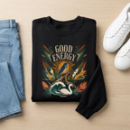Unisex botanical sweatshirt, black with colorful bird and leaf front graphic.