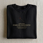 Black personalised sweatshirt with “meet me here” Starbucks, Manchester place name print